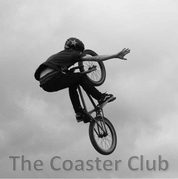 daredevil bmx rider practicing airborne moves at a show